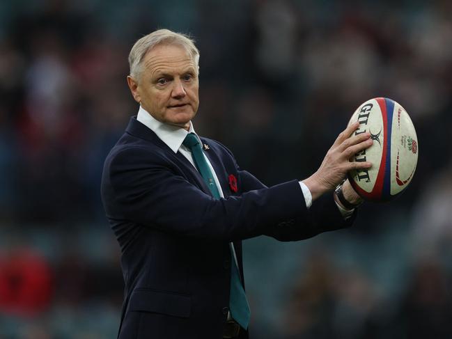 Australia's New Zealand head coach Joe Schmidt with a ball ahead of kick-off in the Autumn Nations Series International rugby union test match between England and Australia at the Allianz Stadium, Twickenham in south-west London, on November 9, 2024. (Photo by Adrian Dennis / AFP)