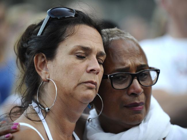 People march in memory of the victims of the downed Malaysia Airlines flight MH17 in Amsterdam. Picture: AFP Photo/John Thys