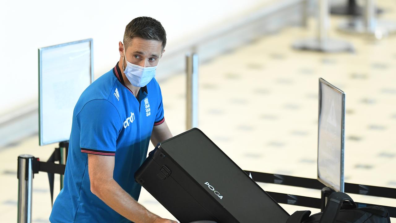 England swing bowler Chris Woakes arrives at Brisbane Airport. Photo by Albert Perez/Getty Images