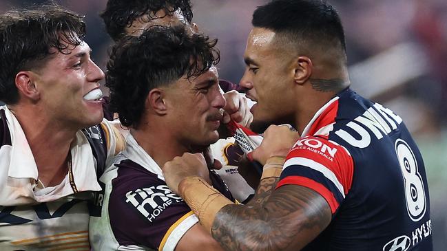 LAS VEGAS, NEVADA - MARCH 02: SpencerÃÂ Leniu (r) of the Roosters exchanges heated words with KotoniÃÂ Staggs of the Broncos during the round one NRL match between Sydney Roosters and Brisbane Broncos at Allegiant Stadium, on March 02, 2024, in Las Vegas, Nevada. (Photo by Ezra Shaw/Getty Images)