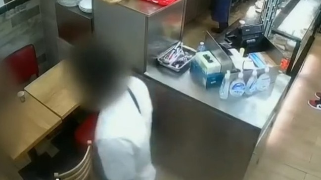 One of the alleged attackers enters the kebab shop. Picture: 7News