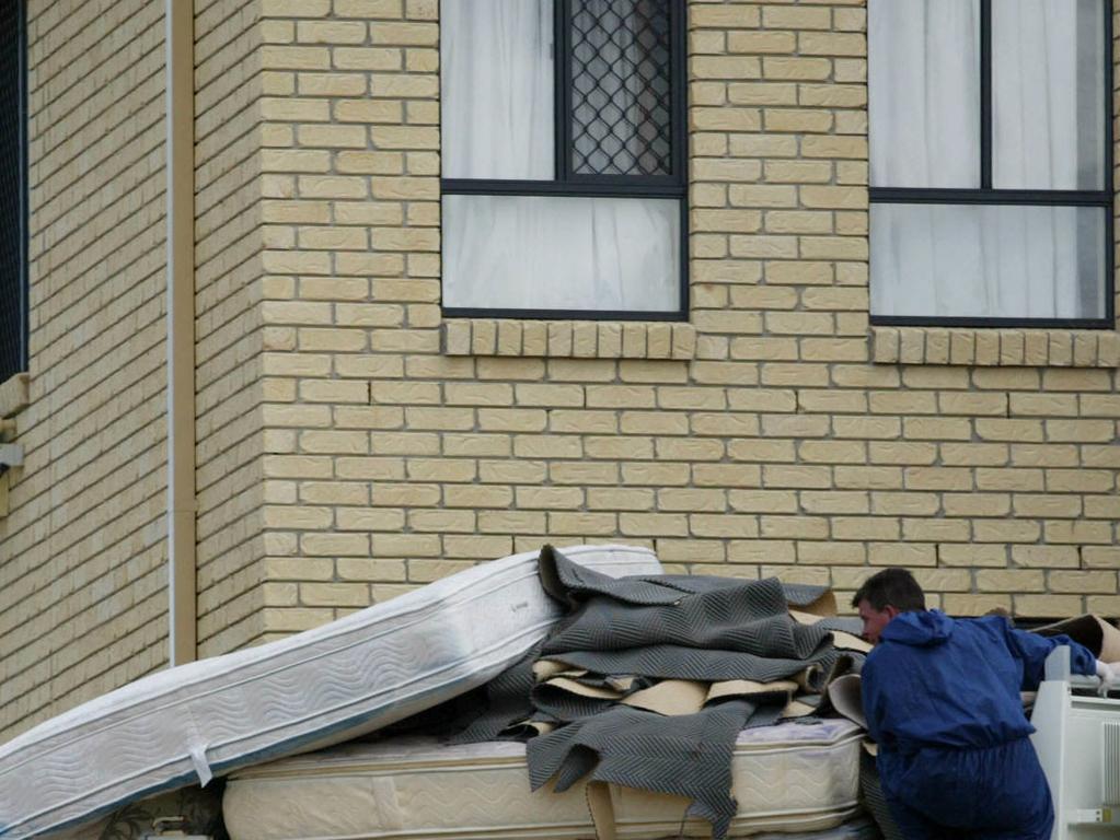 Mattresses and carpet seen on the back of a truck at the home of the Singhs following the murders. Picture: Anthony Weate