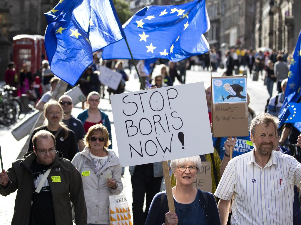 Protesters from the European Movement in Scotland hold a walking vigil outside the Scottish parliament, Edinburgh, to demonstrate against Prime Minister Boris Johnson proroguing parliament, in Edinburgh, Scotland. Picture: AP