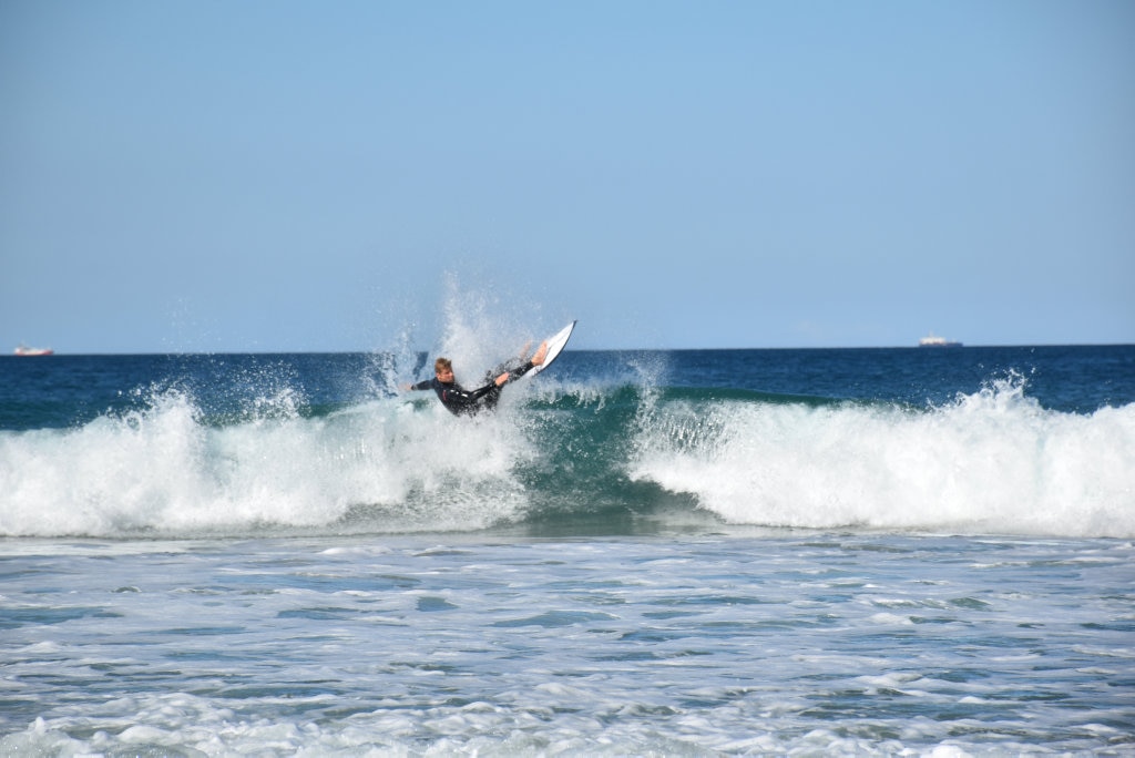 Surfers and bodyboard riders making the most of the waves at Kawana on the weekend. Picture: Mark Furler