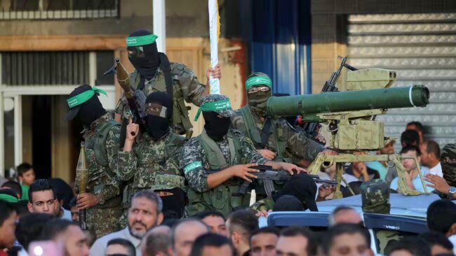 Iran has masterminded a remote missile-building program for Gaza, the products being hammered together in hidden workshops. Picture: Getty / Said Khatib/AFP