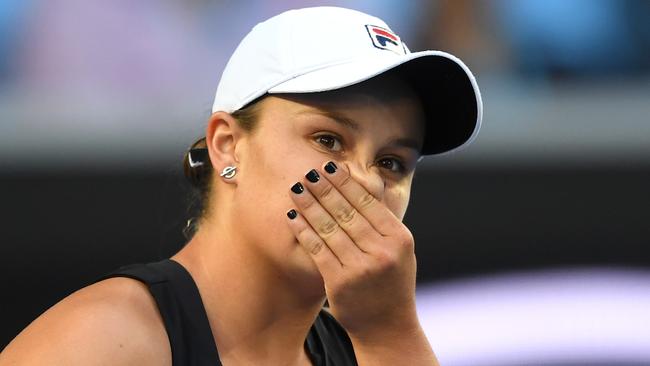 Ashleigh Barty reacts during her win against Shelby Rogers in round 2 of the Womens Singles on day three of the Australian Open. (AAP Image/Lukas Coch)