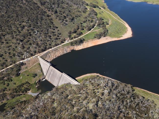 POOL PHOTO: Aerial view of Tantangara Dam seen during Prime Minister Scott Morrison's aerial tour via helicopter of Snowy Hydro sites, on Friday 3 December 2021. Pool photo: Alex Ellinghausen