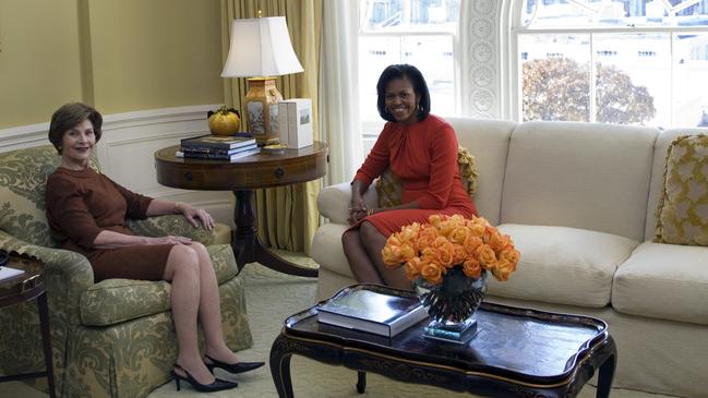 Former First ladies Laura Bush and Michelle Obama in 2008.