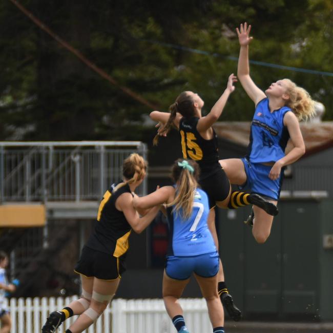 Sturt’s Zoe Prowse battling in the ruck contest against Glenelg’s Caitlin Gould. Picture: Peter Swan