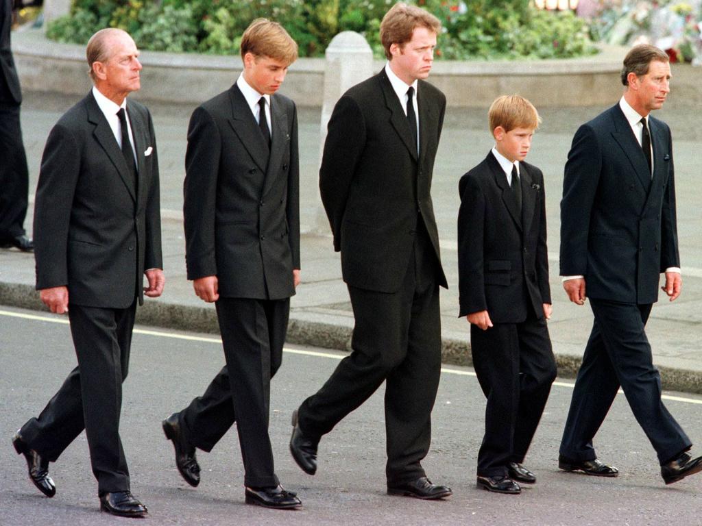 Prince Harry with his father, brother, uncle, and grandfather at Diana’s funeral. Picture: JEFF J MITCHELL