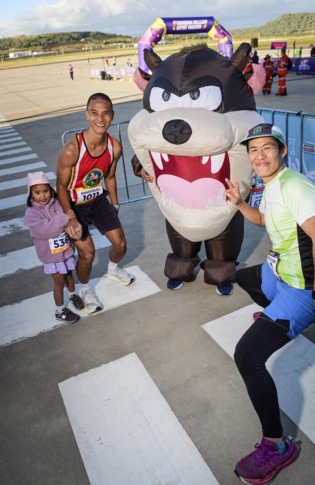 Victoria competitor Normandy Calma as Taz, the Tasmanian devil with (from left) Juno Vergara, Emmanuel Vergara, and John White at the Toowoomba Marathon events at Wellcamp Airport, Saturday, May 3, 2025. Picture: Kevin Farmer