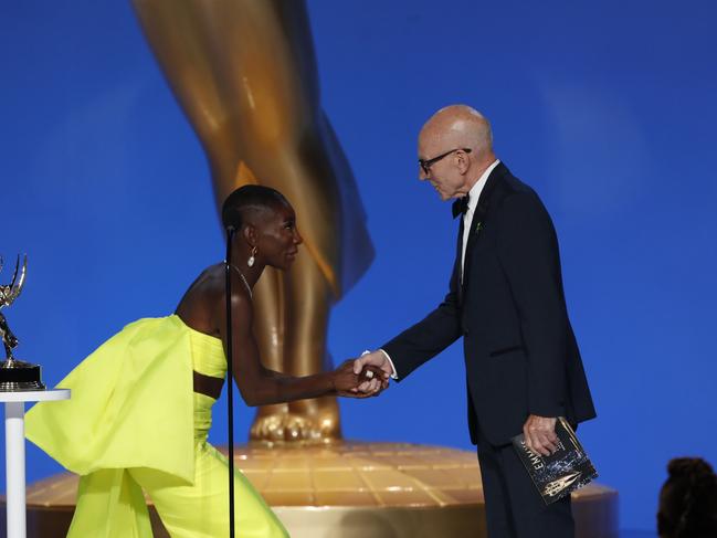 Michaela Coel accepts her award from Sir Patrick Stewart. Picture: Getty Images