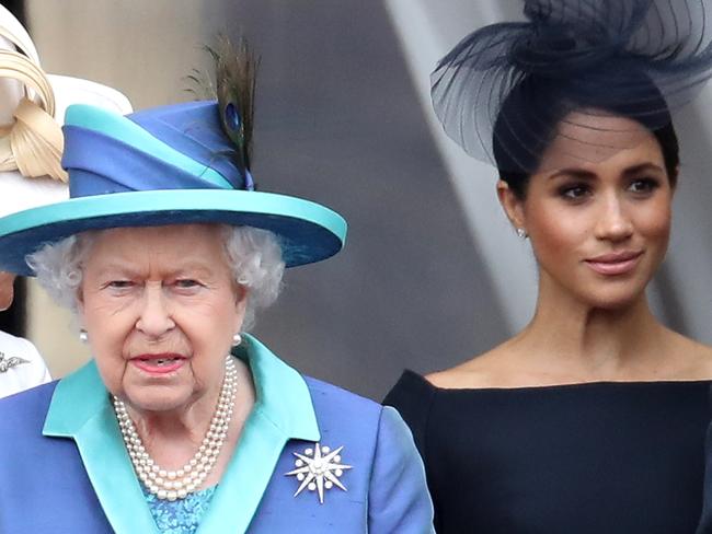 (FILE PIC) LONDON, ENGLAND - JULY 10: Queen Elizabeth II, Prince Harry, Duke of Sussex and Meghan, Duchess of Sussex on the balcony of Buckingham Palace as the Royal family attend events to mark the Centenary of the RAF on July 10, 2018 in London, England. (Photo by Chris Jackson/Getty Images)