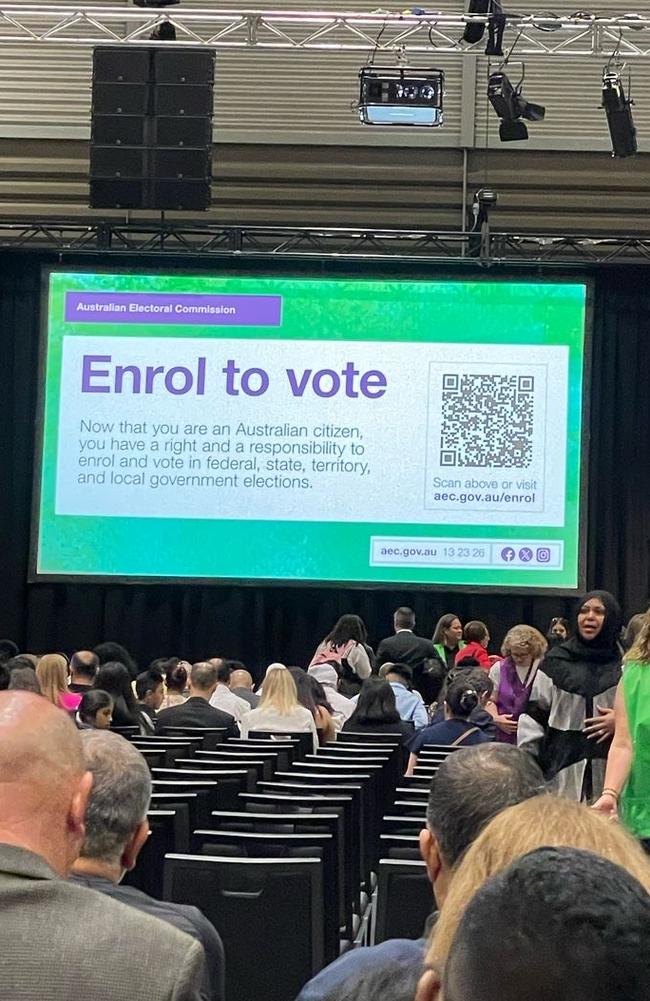 And AEC message on a screen at a citizenship ceremony at Strathfield. Picture: Supplied