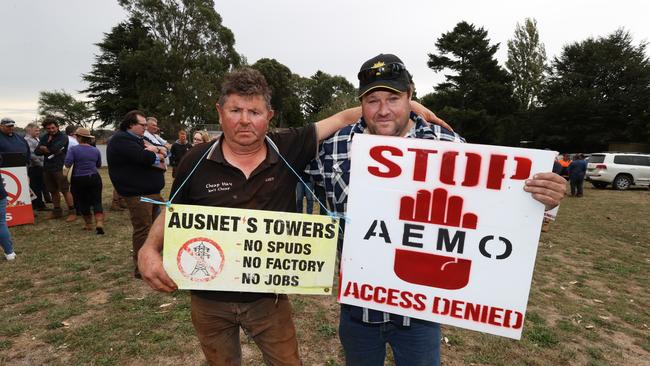 Farmers at the protest. Will Elsworth (right) called attending AusNet representatives “clowns”. Picture: David Caird