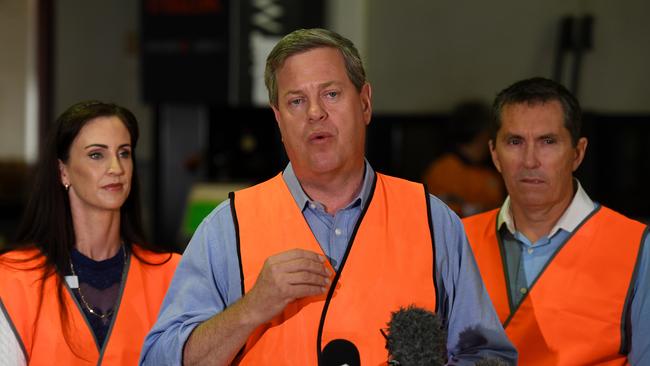 Queensland OppositIon Leader Tim Nicholls, flanked by the LNP candidate for Pine Rivers Chris Thompson (right) and the LNP candidate for Bancroft Kara Thomas, at Berg Engineering in Brisbane today. Picture: AAP/Dan Peled