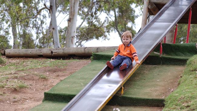 A child on the original Dunstan Adventure Playground slide. Picture: Cathy Davis