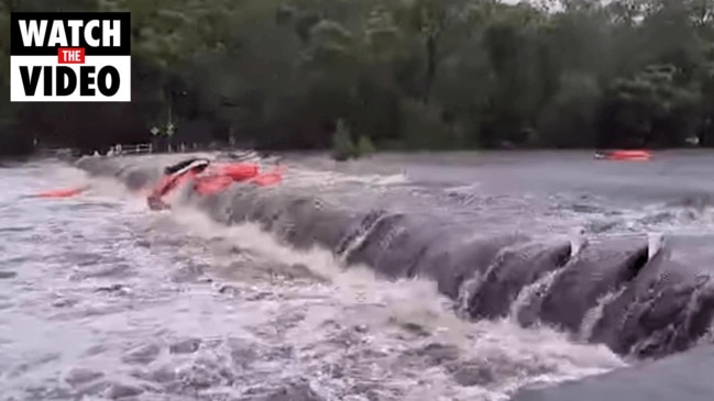 Kayaks wash over Audley Weir