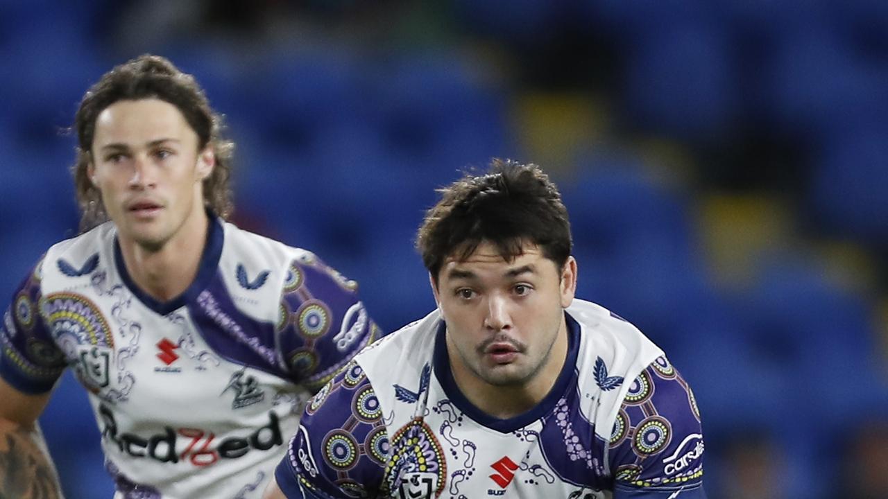 The Storm are desperate to ensure Brandon Smith doesn’t follow Sharks recruit Nicho Hynes (background) out of Melbourne.