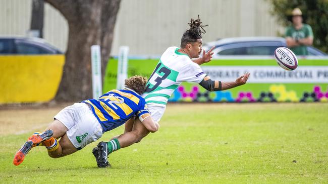 Matt Smit tackles Puni Aupuni. Picture: Richard Walker