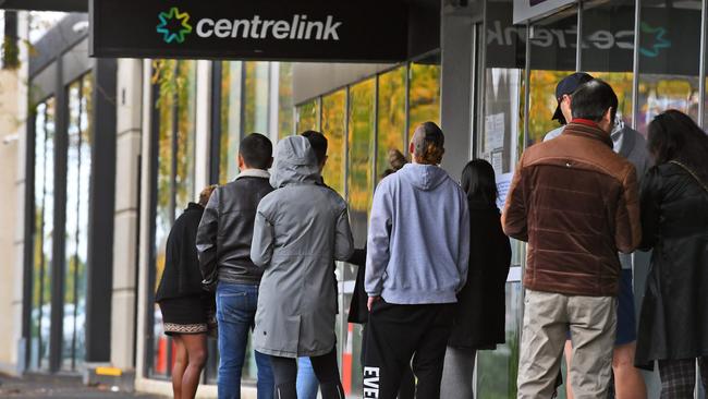 Thousands of people queued outside Centrelink at the start of the first COVOD-19 lockdown when businesses were forced to close. Photo: William West/AFP