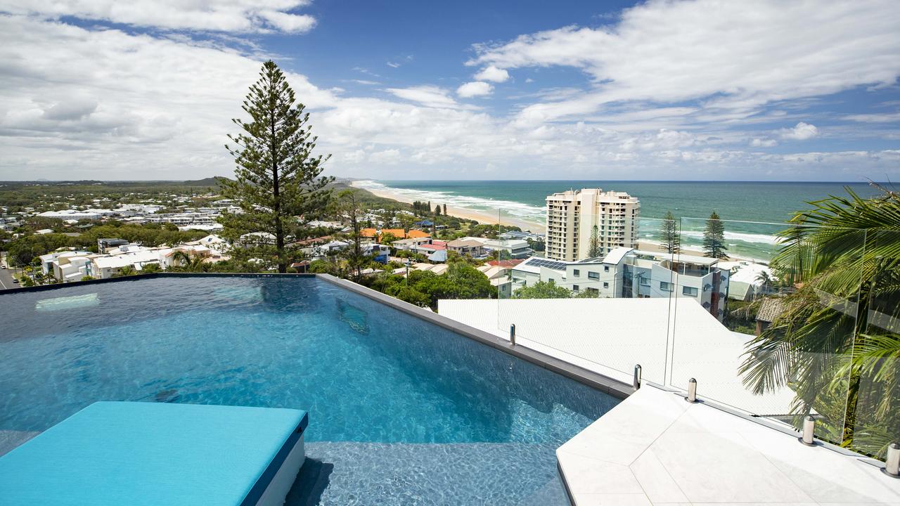 Views over the pool and Coolum Beach from the top deck at 31 Pacific Heights Court. Picture Lachie Millard