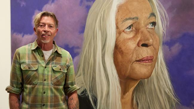 Archibald Prize People's Choice award 2024 winner Angus McDonald with his portrait Professor Marcia Langton AO. Picture: The Art Gallery of New South Wales