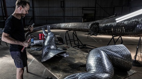 Stephen Langton and his giant lizard. The project is back on track.