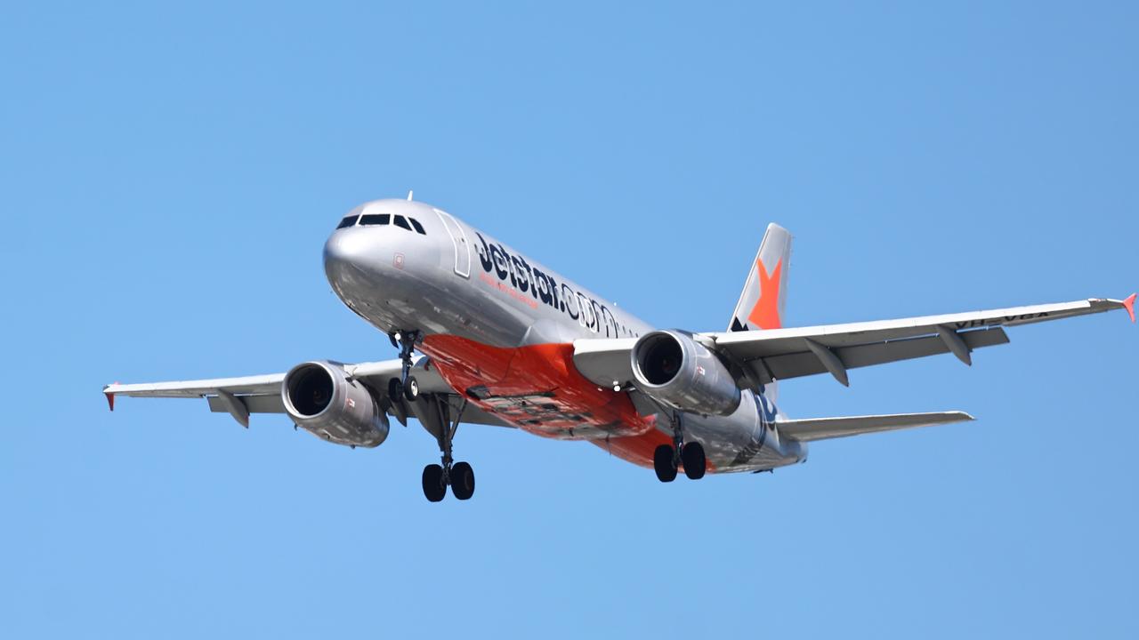 A Jetstar Airbus A320 commercial passenger jet plane comes into land at the Cairns International Airport. Picture: Brendan Radke