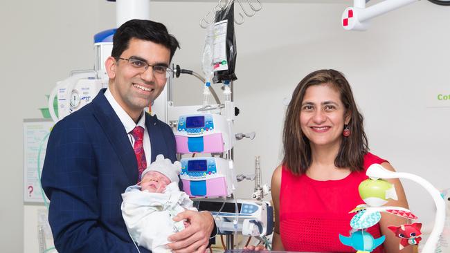 Monash baby doctors, husband and wife team Dr Atul Malhotra and Dr Arunaz Kumar, work at Monash saving the lives of premmie babies. Picture: Sarah Matray