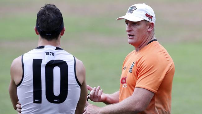 Michael Voss talks to Travis Boak during the Power’s preseason camp in Noosa. Picture Sarah Reed