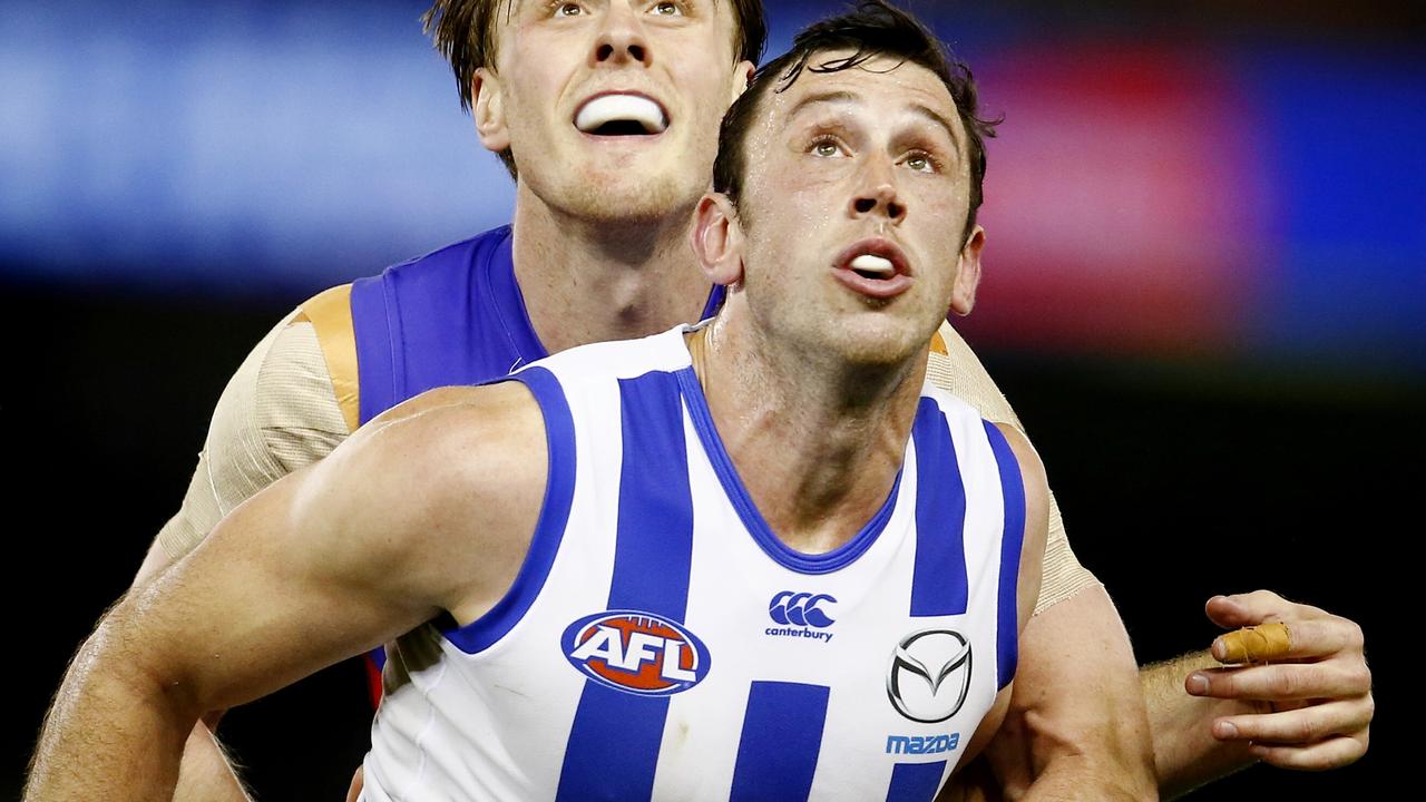 AFL Round 22. North Melbourne vs Western Bulldogs at Etihad Stadium. Todd Goldstein and Jordan Roughead contest a boundary throw in. Pic: Michael Klein. Saturday August 29, 2015.