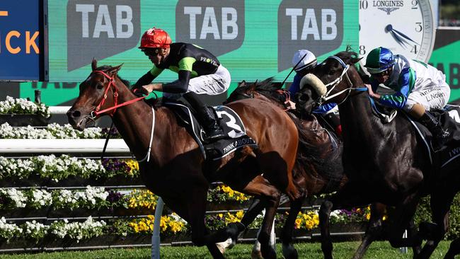 Think About It and jockey Sam Clipperton hold on to win The Everest at Randwick on Saturday. Picture: AFP