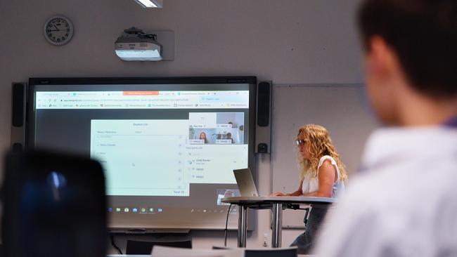 Teacher Cindy Bunder is seen demonstrating a virtual classroom at Glenunga High School in early April. The school has introduced virtual classrooms. Picture: AAP Image/David Mariuz