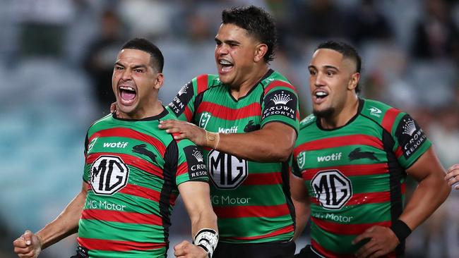 Great mates Cody Walker and Latrell Mitchell, with Rabbitohs forward Keaon Koloamatangi. Picture: Matt King/Getty Images