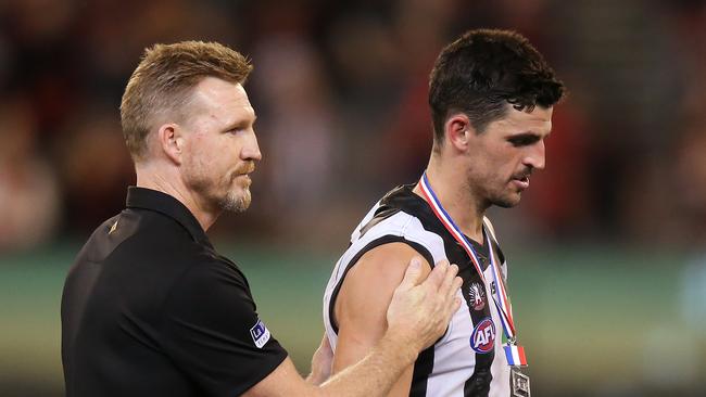 Collingwood coach Nathan Buckley congratulates Scott Pendlebury after the match. Pic: Getty Images