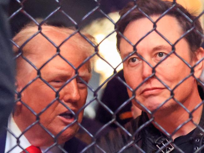 (FILES) US President-elect Donald Trump (L) and Tesla and SpaceX CEO Elon Musk watch a fight during UFC 309 at Madison Square Garden in New York, on November 16, 2024. The US House of Representatives on December 19, 2024 overwhelmingly rejected a Republican-led funding bill aimed at averting a government shutdown, with federal agencies due to run out of cash on Friday night and cease operations starting this weekend. Several political allies of Trump were also in attendance including entrepreneurs Elon Musk and Vivek Ramaswamy, who have been asked by Trump to lead efforts to cut government inefficiency. (Photo by Kena Betancur / AFP)