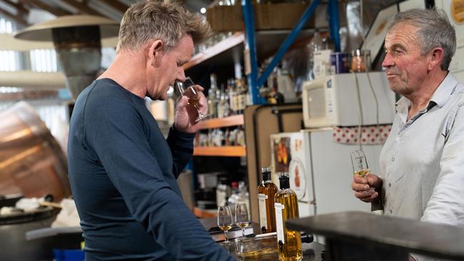 Gordon Ramsay enjoys sampling Peter Bignell's whisky after his distilling lesson at Belgrove Distillery. Picture: NATIONAL GEOGRAPHIC/JUSTIN MANDEL