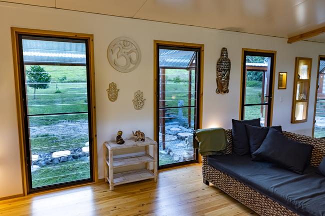 The Mount Jukes Eco Resort, built from scratch by yoga aficionado David Deakin, holds glamping tents and a half-moon shaped house that face Mt Jukes and Mr Deakin says the â€œenergyâ€ of the property has to be experienced to be understood. Picture: Contributed