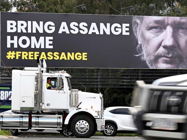 A giant billboard in Melbourne on September 5, 2023 calls for the release of WikiLeaks founder, Australian Julian Assange. A multi-party delegation of Australian federal MPs and senators will travel to Washington DC in September as part of the campaign to release Assange. (Photo by William WEST / AFP)