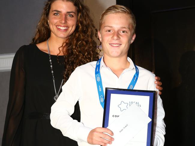 Blake Tickell receiving his award from world champion slalom canoeist and Olympic medallist Jessica Fox. Picture: Damian Shaw