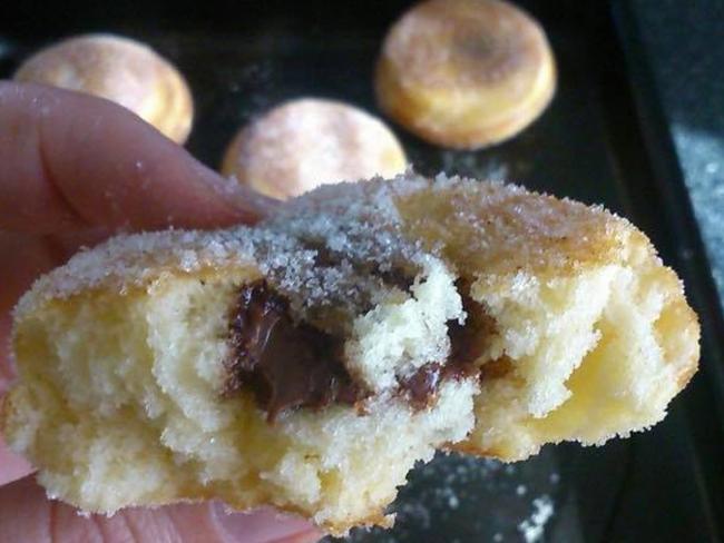 The inside of the doughnut is filled with Nutella.