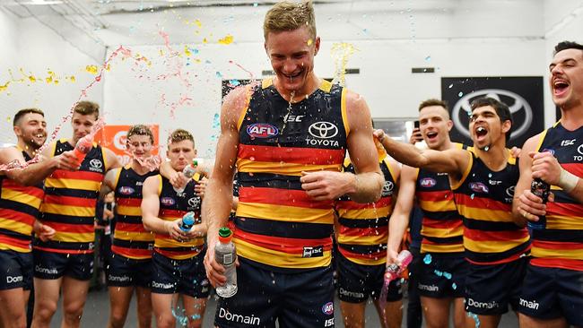 Alex Keath celebrates after his first game of football. Picture: Getty Images