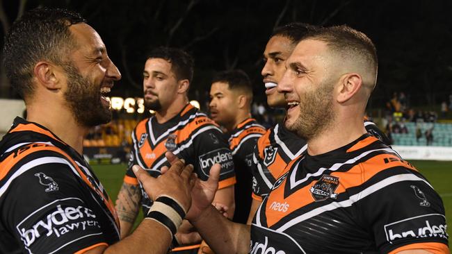 Robbie Farah celebrates with Benji Marshall after the victory. Picture: Dean Lewins