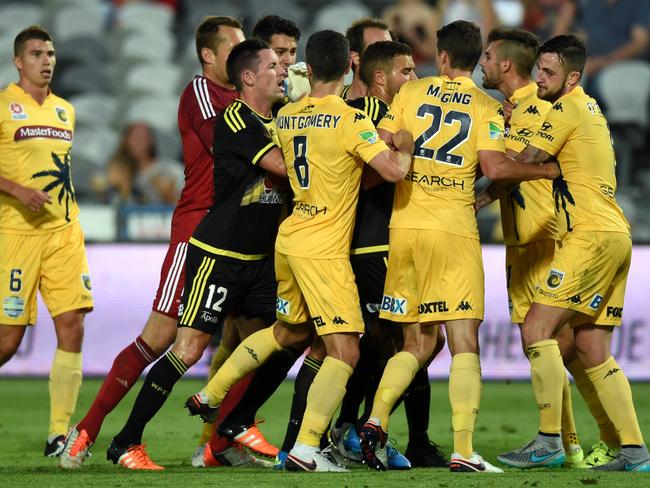 Players scuffle after Roy O’Donovan’s headbutt on Manny Muscat.