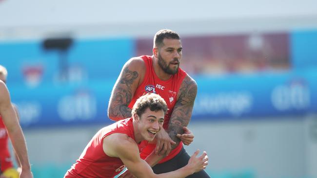 Lance Franklin and Will Hayward work together during a training at the SCG. Picture. Phil Hillyard