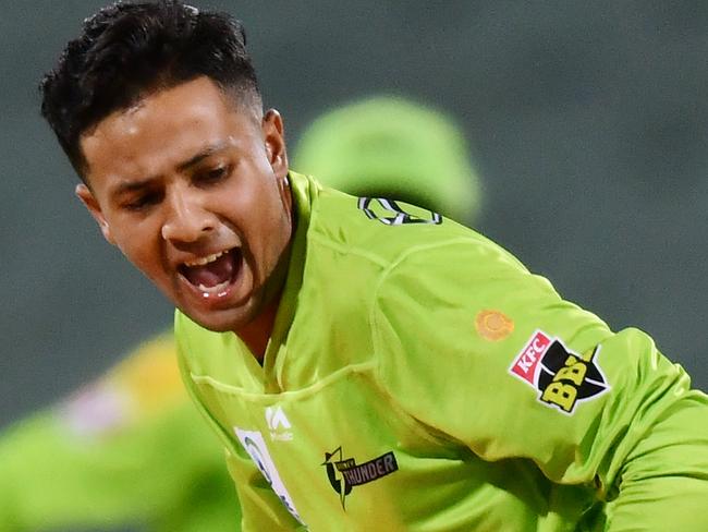 ADELAIDE, AUSTRALIA - JANUARY 22: Tanveer Sangha of the Thunder runs out Josh Philippe of the Sixers  during the Big Bash League match between the Sydney Sixers and the Sydney Thunder at Adelaide Oval, on January 22, 2021, in Adelaide, Australia. (Photo by Mark Brake/Getty Images)