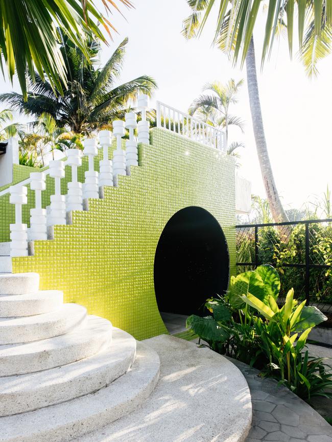 The lime-green tiled waterslide is among several eye-catching features. Picture: Elise Hassey.