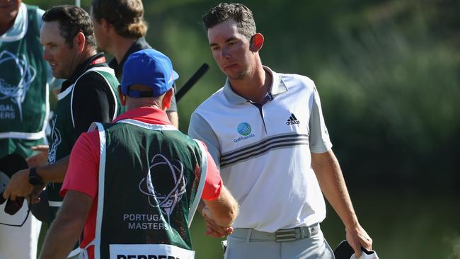 Lucas Herbert shakes hands after finishing his round at the Portugal Masters.