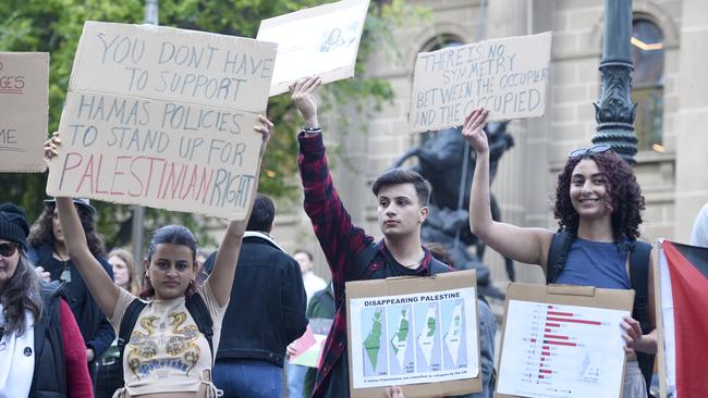 Hundreds attended, many bearing placards with pro-Palestine or anti-Israel sentiments. Picture: NCA NewsWire / Andrew Henshaw